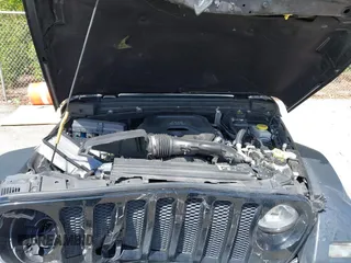 2020 Jeep Wrangler Unlimited Sport S z VIN 1C4HJXDN1LW223664, wystawiony jako IAAI lot #41886832 z przebiegiem 77 019 mil mil oraz . Historia ofert i sprzedaży dostępna na DreamBid. Obrazek 10.