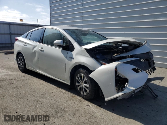 2020 Toyota Prius LE z VIN JTDKARFP5L3158691, wystawiony jako Copart lot #55255125 z przebiegiem Nie podano mil oraz Szkoda całkowita • Salvage title. Historia ofert i sprzedaży dostępna na DreamBid. Obrazek 4.