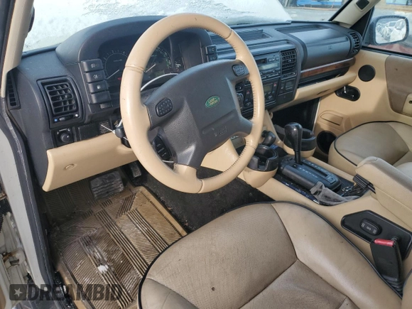 2004 Land Rover Discovery SE z VIN SALTW19494A839791, wystawiony jako Copart lot #45903105 z przebiegiem 139 847 mil mil oraz Czysty tytuł • Clean title. Historia ofert i sprzedaży dostępna na DreamBid. Obrazek 8.