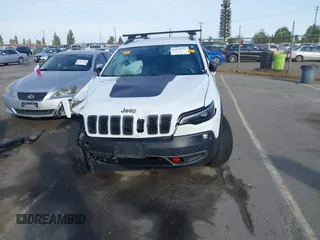 2019 Jeep Cherokee Trailhawk Elite with VIN 1C4PJMBX7KD410612, listed as a IAAI auction lot 41878935 with 55,163 mi miles. Bid and sale history available at carsss.com. Image 13.