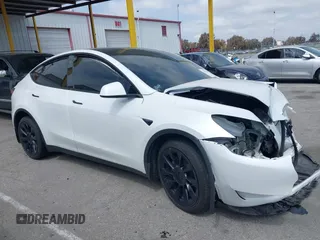 2023 Tesla Model Y Long Range with VIN 7SAYGDEE9PA026005, listed as a IAAI auction lot 41895223 with 43,813 mi miles and . Bid and sale history available at DreamBid. Image 13.