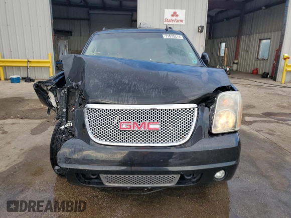 2012 GMC Yukon XL Denali with VIN 1GKS1MEF9CR323090, listed as a Copart auction lot 71675214 with 143,408 mi miles and Salvage Title. Bid and sale history available at carsss.com. Image 5.