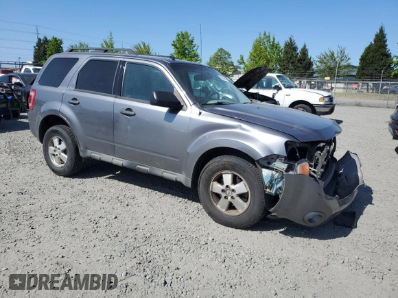 2011 Ford Escape XLT z VIN 1FMCU9DG7BKC39271, wystawiony jako Copart lot #55880445 z przebiegiem 202 072 mil mil oraz Szkoda całkowita • Salvage title. Historia ofert i sprzedaży dostępna na DreamBid. Obrazek 4.