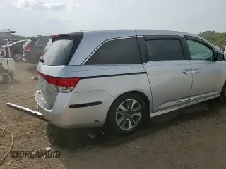 2014 Honda Odyssey Touring with VIN 5FNRL5H93EB034263, listed as a Copart auction lot 57254485 with 150,084 mi miles and Salvage title. Bid and sale history available at DreamBid. Image 14.