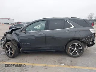 2021 Chevrolet Equinox Premier z VIN 2GNAXXEV2M6118116, wystawiony jako IAAI lot #41185151 z przebiegiem 91 837 mil mil oraz . Historia ofert i sprzedaży dostępna na DreamBid. Obrazek 14.