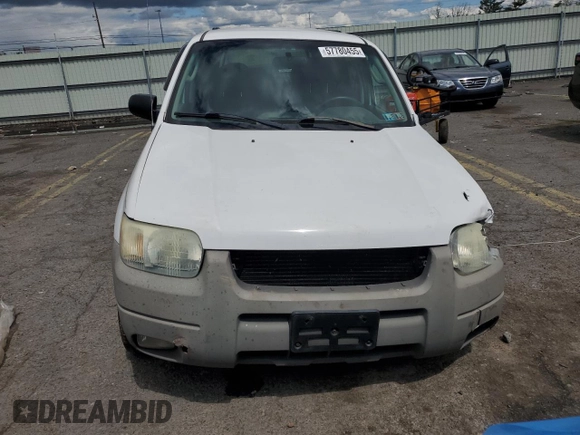 2003 Ford Escape XLT Popular 2 with VIN 1FMYU93133KD76423, listed as a Copart auction lot 57780455 with 98,779 mi miles and Salvage title. Bid and sale history available at DreamBid. Image 5.