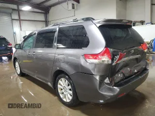 2011 Toyota Sienna XLE with VIN 5TDDK3DC3BS014640, listed as a Copart auction lot 52092045 with 190,090 mi miles and Salvage Title. Bid and sale history available at DreamBid. Image 2.