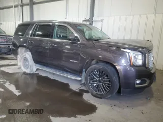 2015 GMC Yukon SLT with VIN 1GKS2BKC7FR279302, listed as a Copart auction lot 47827085 with 176,076 mi miles and Salvage Title. Bid and sale history available at carsss.com. Image 4.