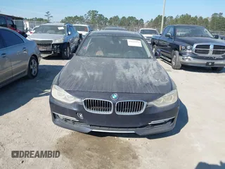 2014 BMW 3 Series 335i with VIN WBA3A9C54EF477943, listed as a IAAI auction lot 41632554 with 102,273 mi miles. Bid and sale history available at carsss.com. Image 12.