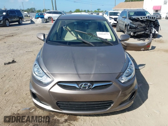 2012 Hyundai Accent GLS with VIN KMHCT4AE4CU097413, listed as a IAAI auction lot 42024571 with 120,672 mi miles. Bid and sale history available at carsss.com. Image 11.