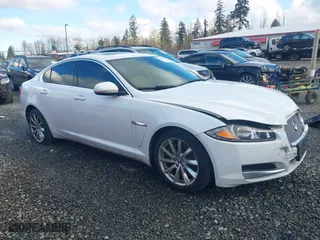 2013 Jaguar XF I4 RWD with VIN SAJWA0ES5DPS80174, listed as a IAAI auction lot 41378775 with 160,497 mi miles. Bid and sale history available at carsss.com. Image 1.
