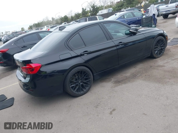 2018 BMW 3 Series 320i with VIN WBA8E1G54JNU93257, listed as a IAAI auction lot 41719141 with 144,381 mi miles. Bid and sale history available at carsss.com. Image 4.