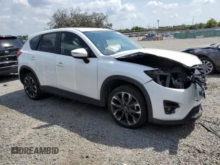 2016 Mazda CX-5 Grand Touring with VIN JM3KE2DY0G0804354, listed as a Copart auction lot 50311185 with 105,588 mi miles and Salvage Title. Bid and sale history available at carsss.com. Image 4.