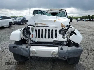 2013 Jeep Wrangler Unlimited Sahara with VIN 1C4HJWEG1DL516784, listed as a Copart auction lot 56382805 with 205,874 mi miles and Salvage title. Bid and sale history available at DreamBid. Image 5.