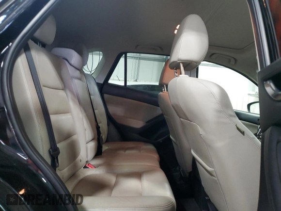 2014 Mazda CX-5 Grand Touring with VIN JM3KE4DY0E0322606, listed as a Copart auction lot 54381815 with 216,022 mi miles and Salvage Title. Bid and sale history available at DreamBid. Image 11.