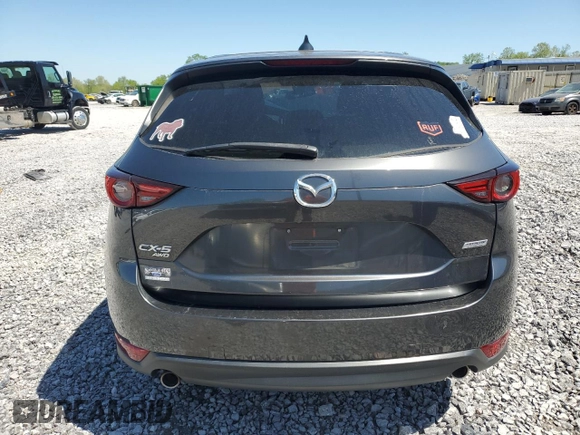 2018 Mazda CX-5 Grand Touring z VIN JM3KFBDM3J0351106, wystawiony jako Copart lot #52553925 z przebiegiem Nie podano mil oraz Szkoda całkowita • Salvage title. Historia ofert i sprzedaży dostępna na DreamBid. Obrazek 6.