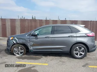 2023 Ford Edge SEL z VIN 2FMPK4J98PBA03830, wystawiony jako IAAI lot #41992054 z przebiegiem 21 081 mil mil oraz . Historia ofert i sprzedaży dostępna na DreamBid. Obrazek 14.