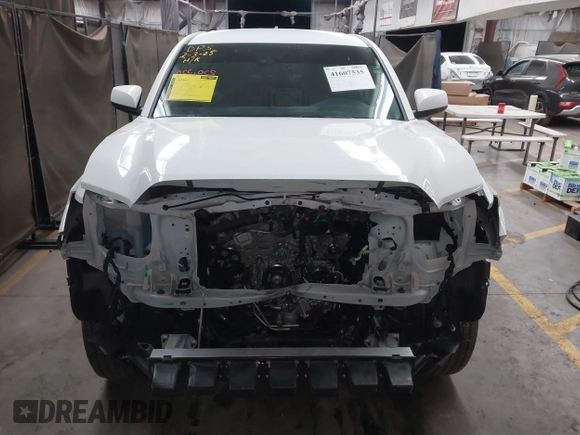 2023 Toyota Tacoma SR5 z VIN 3TYAZ5CN9PT030723, wystawiony jako IAAI lot #41607535 z przebiegiem 40 215 mil mil oraz . Historia ofert i sprzedaży dostępna na DreamBid. Obrazek 13.
