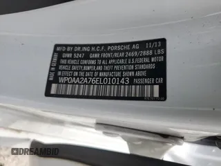 2014 Porsche Panamera z VIN WP0AA2A76EL010143, wystawiony jako Copart lot #54750715 z przebiegiem 132 333 mil mil oraz Szkoda całkowita • Salvage title. Historia ofert i sprzedaży dostępna na DreamBid. Obrazek 13.