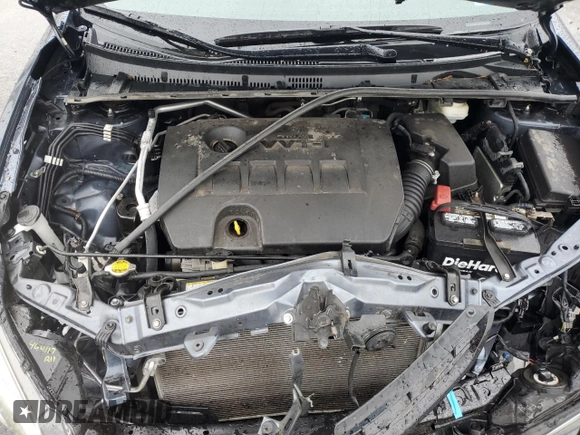 2016 Toyota Corolla L z VIN 2T1BURHEXGC527965, wystawiony jako Copart lot #58090185 z przebiegiem 103 418 mil mil oraz Szkoda całkowita • Salvage title. Historia ofert i sprzedaży dostępna na DreamBid. Obrazek 11.
