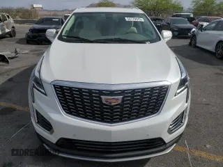 2021 Cadillac XT5 FWD Premium Luxury with VIN 1GYKNCRS0MZ110560, listed as a Copart auction lot 52779575 with 44,559 mi miles and Salvage title. Bid and sale history available at DreamBid. Image 5.