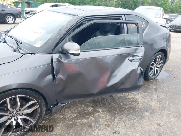 2015 Scion tC z VIN JTKJF5C75F3089895, wystawiony jako IAAI lot #42226465 z przebiegiem 106 694 mil mil oraz . Historia ofert i sprzedaży dostępna na DreamBid. Obrazek 6.