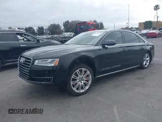 2015 Audi A8 L 4.0T with VIN WAU32AFD4FN033471, listed as a IAAI auction lot 42120112 with 174,882 mi miles. Bid and sale history available at carsss.com. Image 2.