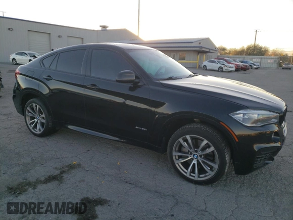 2015 BMW X6 xDrive50i with VIN 5UXKU6C52F0F93975, listed as a Copart auction lot 81944914 with 143,915 mi miles and Salvage Title. Bid and sale history available at carsss.com. Image 4.