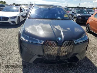 2024 BMW iX M60 z VIN WB533CF00RCN01751, wystawiony jako Copart lot #74145244 z przebiegiem 21 347 mil mil oraz Szkoda całkowita • Salvage title. Historia ofert i sprzedaży dostępna na DreamBid. Obrazek 5.