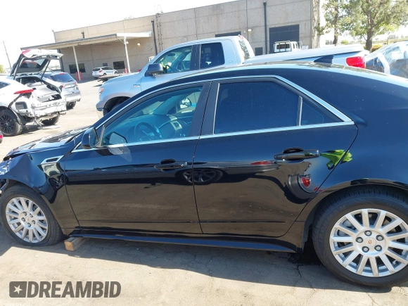 2013 Cadillac CTS Luxury with VIN 1G6DE5E51D0165634, listed as a IAAI auction lot 42208023 with 92,827 mi miles and . Bid and sale history available at DreamBid. Image 14.