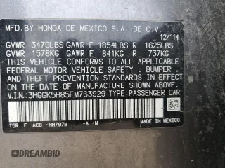 2015 Honda Fit EX-L z VIN 3HGGK5H85FM763929, wystawiony jako Copart lot #60808125 z przebiegiem 79 441 mil mil oraz Szkoda całkowita • Salvage title. Historia ofert i sprzedaży dostępna na DreamBid. Obrazek 13.