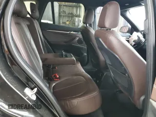 2017 BMW X1 xDrive28i z VIN WBXHT3Z39H4A57395, wystawiony jako Copart lot #56357845 z przebiegiem Nie podano mil oraz Szkody całkowita. Historia ofert i sprzedaży dostępna na DreamBid. Obrazek 11.