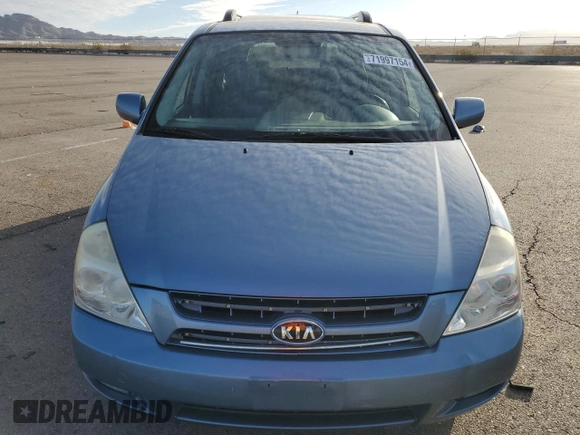 2009 Kia Sedona EX with VIN KNDMB233196275030, listed as a Copart auction lot 71997154 with 96,777 mi miles and Salvage Title. Bid and sale history available at carsss.com. Image 5.