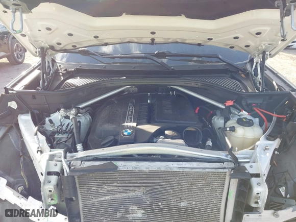 2016 BMW X5 xDrive35i with VIN 5UXKR0C54G0P27141, listed as a IAAI auction lot 41553602 with 61,947 mi miles. Bid and sale history available at carsss.com. Image 10.