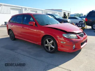 2002 Mazda Protege with VIN JM1BJ245721584742, listed as a IAAI auction lot 41772863 with 207,160 mi miles and . Bid and sale history available at DreamBid. Image 1.
