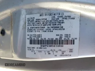 2005 Ford Focus S with VIN 3FAFP31N95R153930, listed as a Copart auction lot 47019315 with 96,985 mi miles and Salvage title. Bid and sale history available at DreamBid. Image 12.
