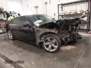 2012 Dodge Charger SXT with VIN 2C3CDXHG4CH142125, listed as a IAAI auction lot 41790623 with 110,252 mi miles. Bid and sale history available at carsss.com. Image 1.