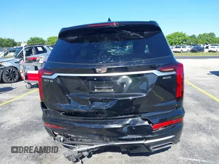2020 Cadillac XT6 FWD Premium Luxury with VIN 1GYKPCRS7LZ211197, listed as a IAAI auction lot 42231424 with 57,351 mi miles and . Bid and sale history available at DreamBid. Image 17.