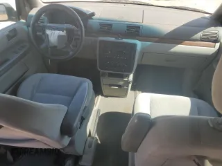 2005 Ford Freestar SEL z VIN 2FMZA52295BA19566, wystawiony jako Copart lot #56758015 z przebiegiem Nie podano mil oraz Szkody całkowita. Historia ofert i sprzedaży dostępna na DreamBid. Obrazek 8.