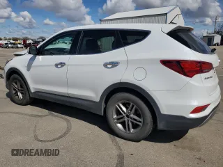 2018 Hyundai Santa Fe 2.4L z VIN 5NMZTDLB1JH076587, wystawiony jako Copart lot #51484585 z przebiegiem 106 026 mil mil oraz Szkoda całkowita • Salvage title. Historia ofert i sprzedaży dostępna na DreamBid. Obrazek 2.