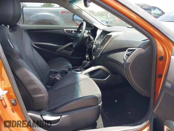 2013 Hyundai Veloster w/Black Int with VIN KMHTC6AD0DU147017, listed as a IAAI auction lot 42707858 with 115,130 mi miles and . Bid and sale history available at DreamBid. Image 5.