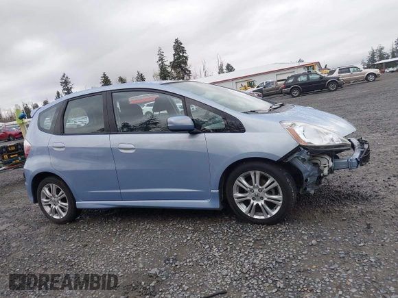 2009 Honda Fit Sport w/Navi with VIN JHMGE886X9S042490, listed as a IAAI auction lot 41931712 with 111,088 mi miles. Bid and sale history available at carsss.com. Image 14.