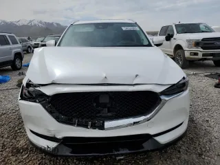 2018 Mazda CX-5 Grand Touring with VIN JM3KFBDM9J0468463, listed as a Copart auction lot 54524805 with 73,389 mi miles and Salvage Title. Bid and sale history available at DreamBid. Image 5.