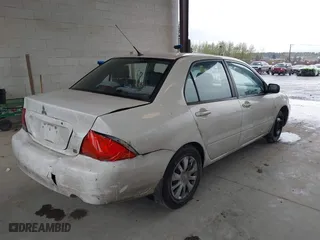 2006 Mitsubishi Lancer ES with VIN JA3AJ26E86U060513, listed as a IAAI auction lot 41980244 with 154,379 mi miles. Bid and sale history available at carsss.com. Image 4.