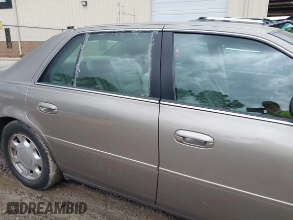 2000 Cadillac DeVille z VIN 1G6KD54Y5YU317015, wystawiony jako IAAI lot #42441249 z przebiegiem 82 901 mil mil oraz . Historia ofert i sprzedaży dostępna na DreamBid. Obrazek 6.