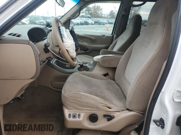 1997 Ford Expedition XLT with VIN 1FMEU17L5VLB80125, listed as a Copart auction lot 83892824 with 257,738 mi miles and Salvage title. Bid and sale history available at DreamBid. Image 7.