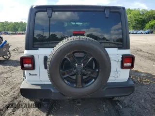2021 Jeep Wrangler Unlimited Sport S with VIN 1C4HJXDG3MW583165, listed as a Copart auction lot 57218275 with 74,353 mi miles and Salvage title. Bid and sale history available at DreamBid. Image 6.