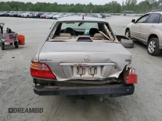 2002 Acura RL z VIN JH4KA96502C009276, wystawiony jako Copart lot #53978405 z przebiegiem 221 090 mil mil oraz Szkoda całkowita • Salvage title. Historia ofert i sprzedaży dostępna na DreamBid. Obrazek 6.