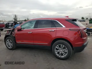 2021 Cadillac XT5 FWD Premium Luxury with VIN 1GYKNCRS7MZ149310, listed as a Copart auction lot 87937445 with 13,829 mi miles and Salvage Title. Bid and sale history available at DreamBid. Image 2.