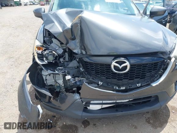 2014 Mazda CX-5 Sport with VIN JM3KE2BE0E0411377, listed as a IAAI auction lot 42143229 with 137,384 mi miles and . Bid and sale history available at carsss.com. Image 6.